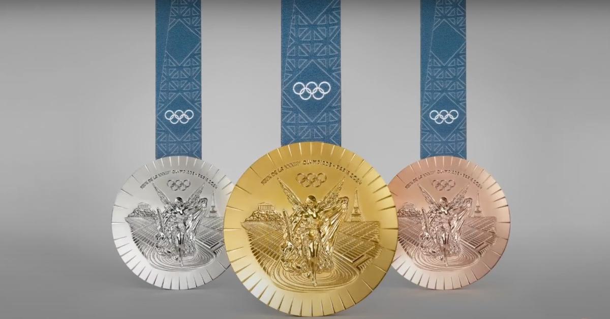 Images of three of the 2024 Paris Olympic medals in silver, gold, and bronze.