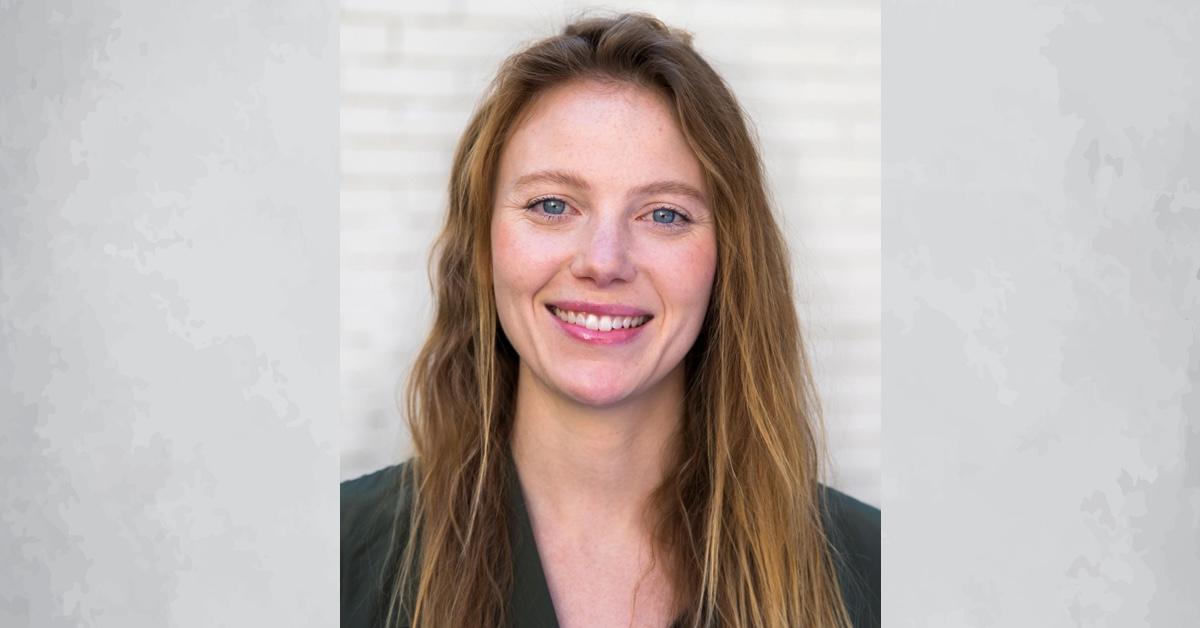 Headshot of EWG Senior Toxicologist Alexis Temkin, Ph.D. smiling on gray background