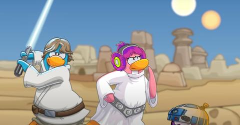 Two characters from New Club Penguin are dressed as Star Wars characters, flanked by an R2D2-like character.