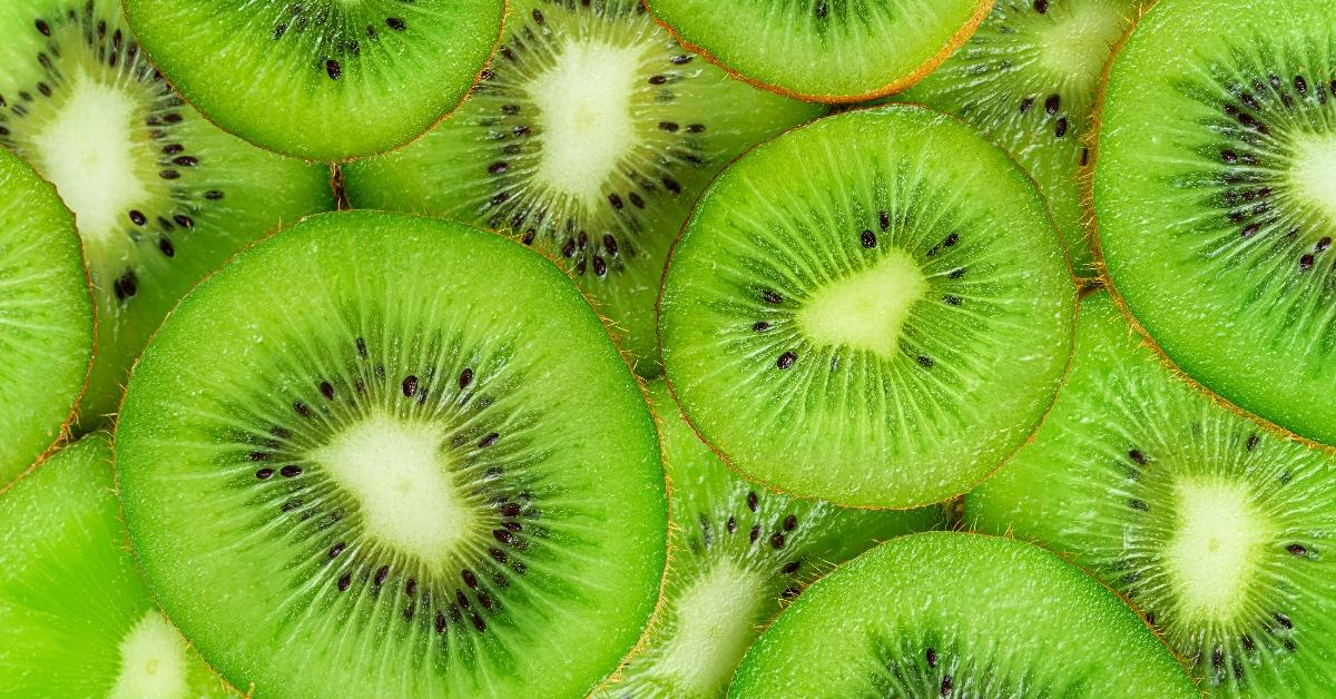 Close-up photograph of sliced kiwifruits. 