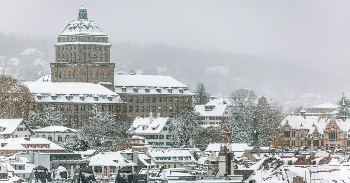 Snow covers the rooftops in a small town 