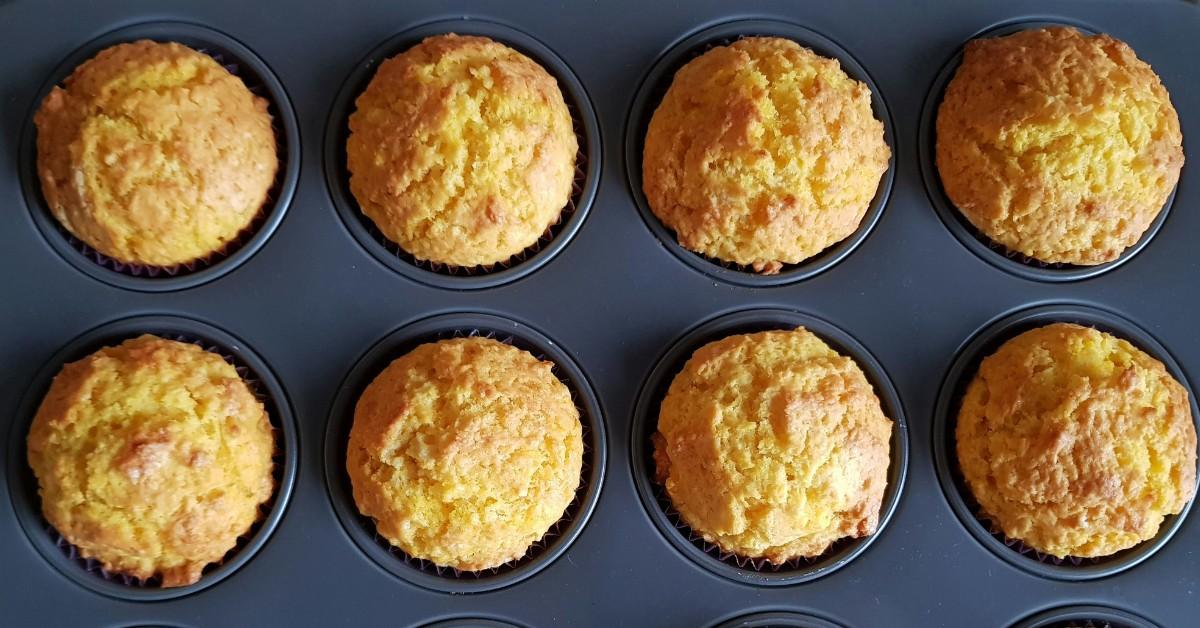 Muffins bake in a blue muffin tin