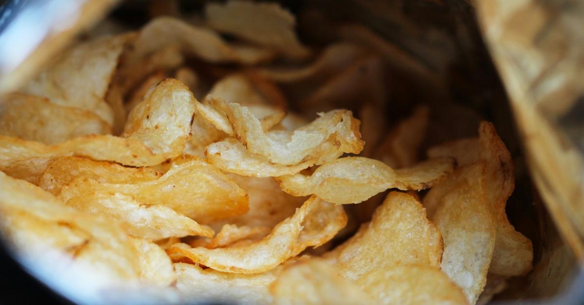 Close-up photograph of a bag of potato chips.