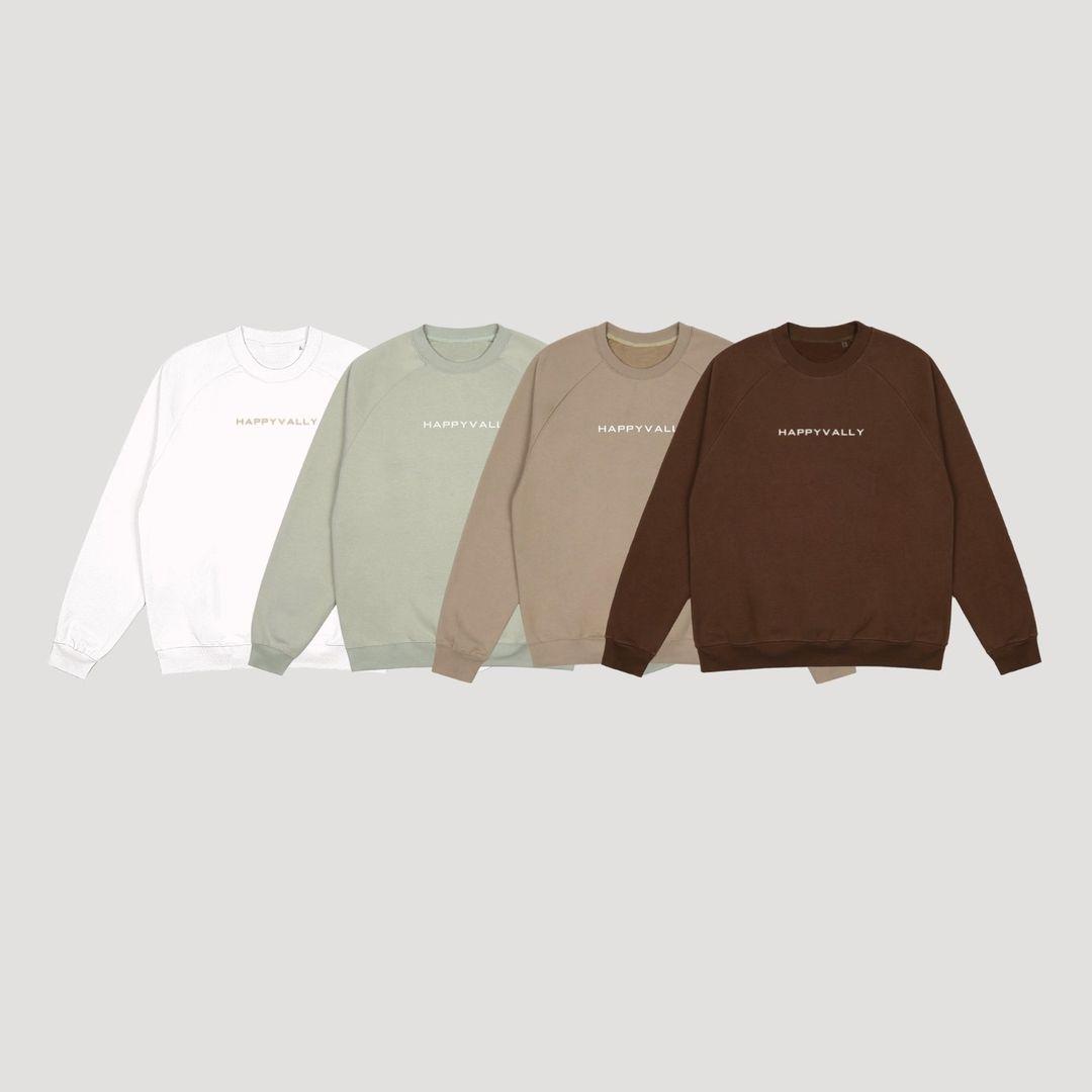 Happy Vally sweatshirts are pictured in various colors with the brand name on them.