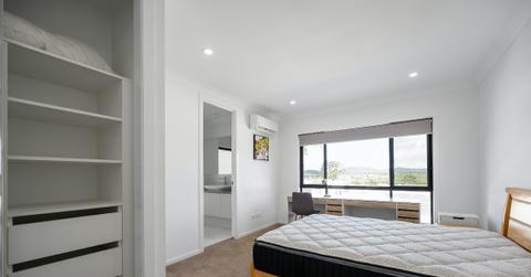 white bedroom with mattress