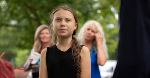 Greta Thunburg looks at the crowd during protest