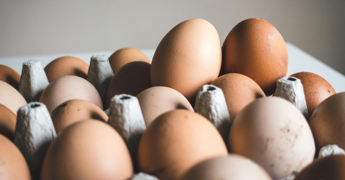 A carton of large brown eggs. 