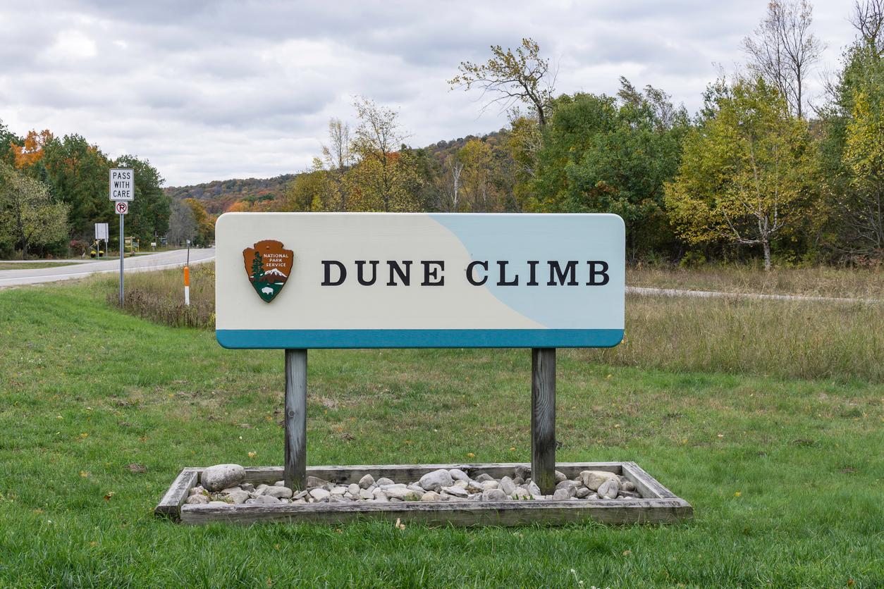 A sign near the road for Lake Michigan's Sleeping Bear Dunes official "Dune Climb."