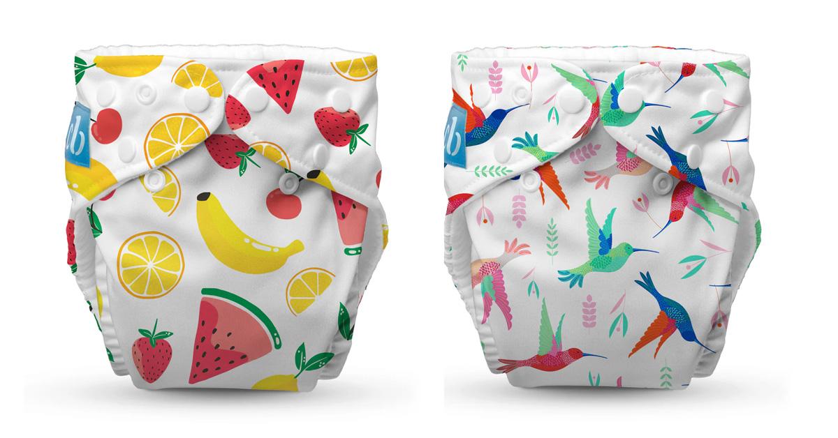 two cloth diapers with fruits and hummingbirds