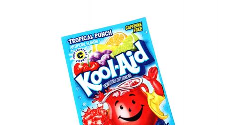 A tropical punch flavored Kool-Aid packet in front of a white background.