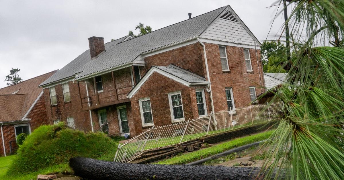 Felled trees in the front yard of a Texas home from Hurricane Beryl on July 8, 2024. 