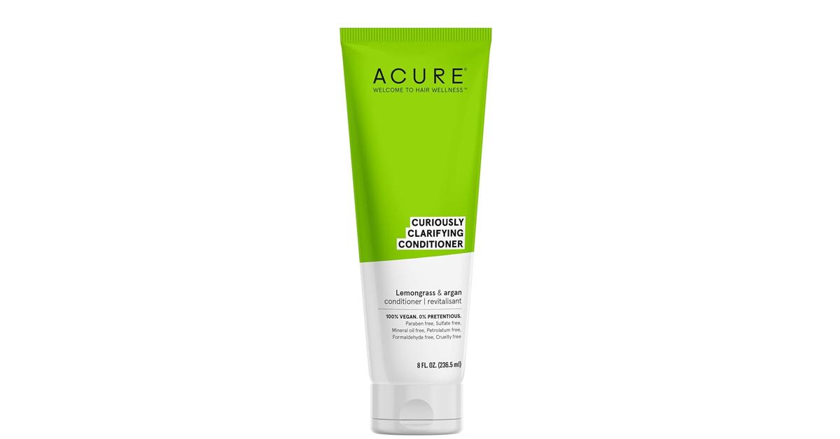 Acure conditioner in a green and white bottle