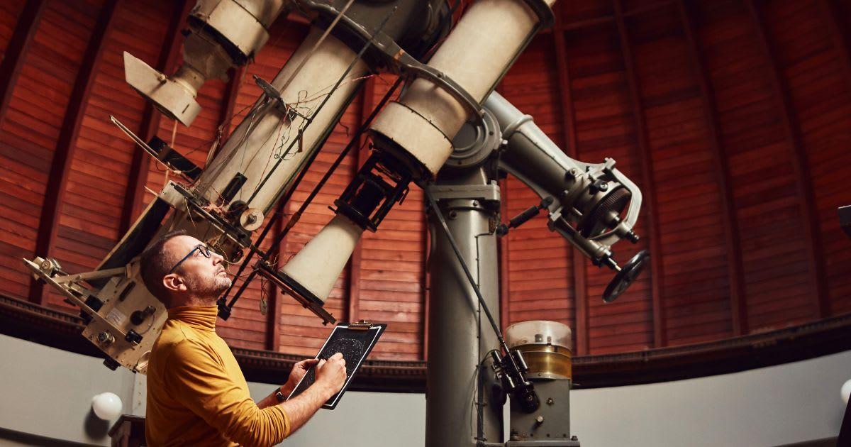 An astronomer noting observation (Representative Cover Image Source: Getty Images | m-gucci)