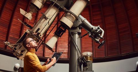 An astronomer noting observation (Representative Cover Image Source: Getty Images | m-gucci)