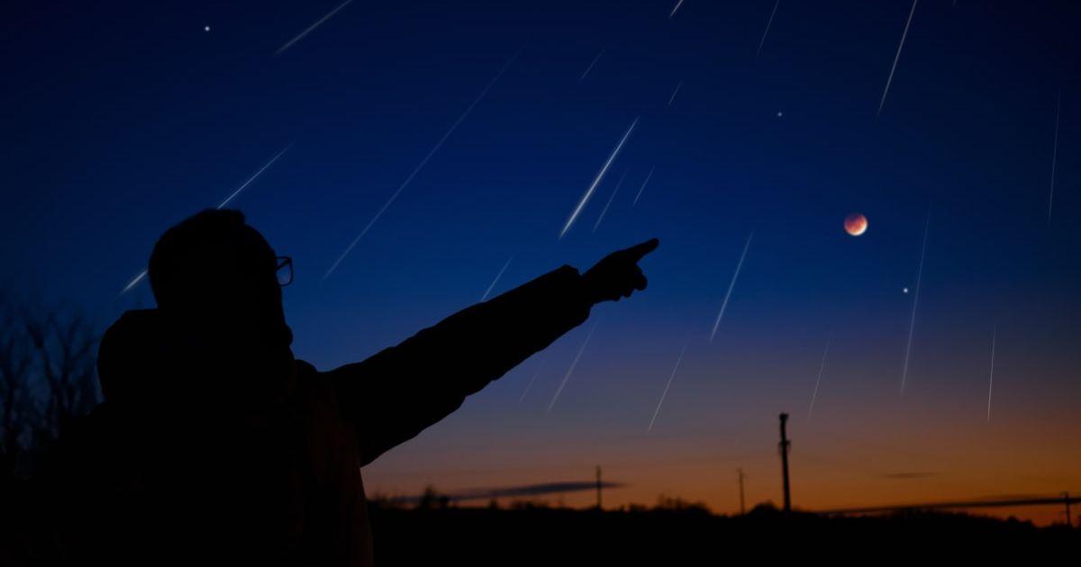 Man beholding a glittering meteor shower in the night sky (Representative Cover Image Source: Getty Images | m-gucci)