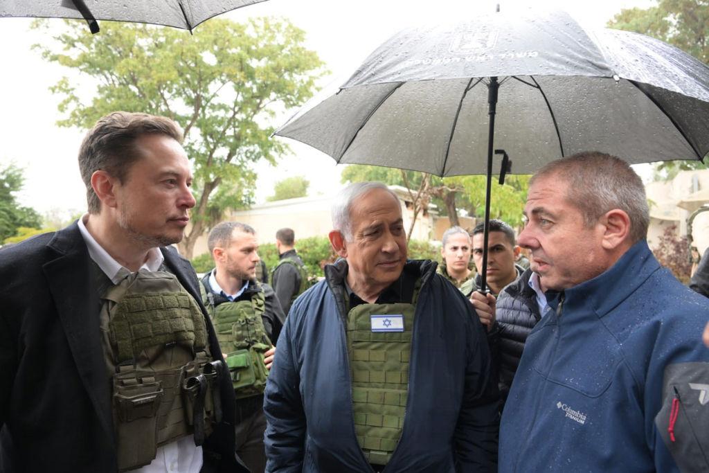 Israel's Prime Minister Benjamin Netanyahu takes Elon Musk on a tour of Kibbutz Kfar Aza (where the Oct. 7 massacre took place) in November 2023.