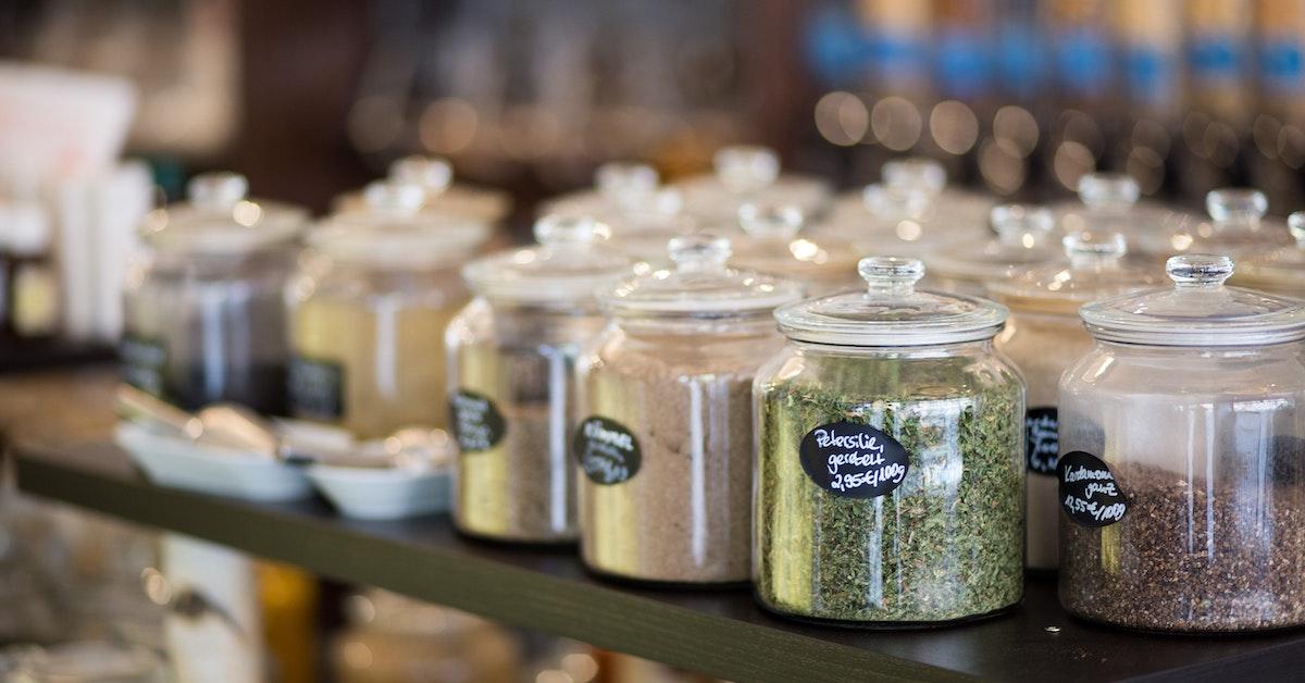 Glass jars filled with spices in a shop