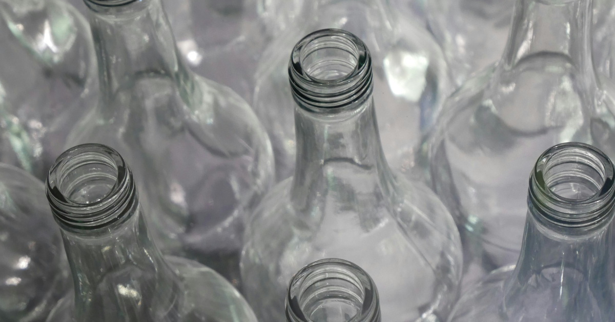 A closeup of clear glass bottles