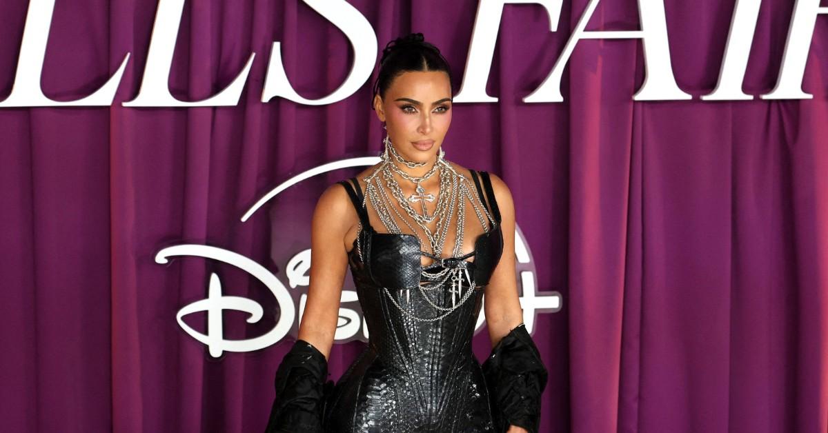 Kim Kardashian poses on the red carpet