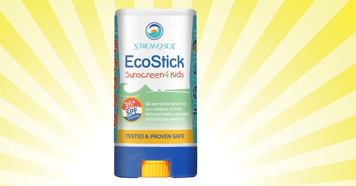 a sunscreen stick against a yellow sunny background.