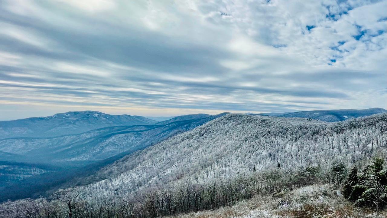 An overview of a mountainous, snow-covered landscape in Great Smoky Mountains National Park.