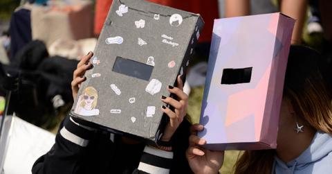 People viewing the eclipse with homemade glasses