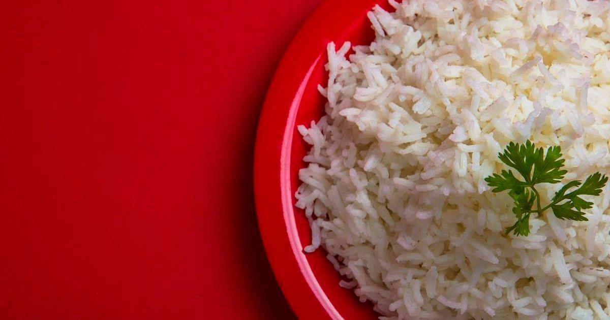 Cooked plain white basmati rice in a red plate on red background (Representative Cover Image Source: Getty Images | Photo by Adina Vlasceanu)