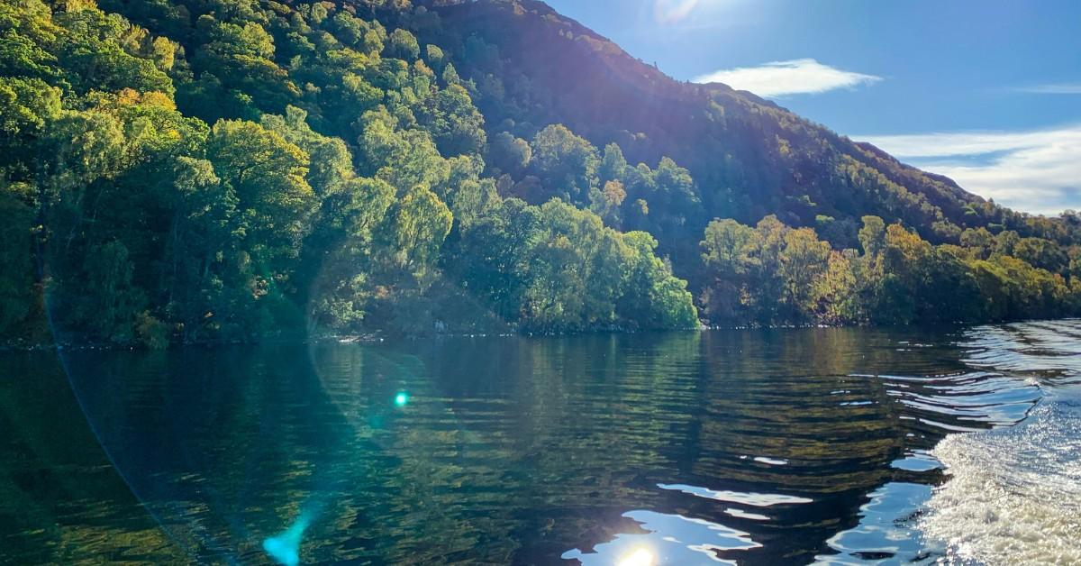 The sun shines brightly over the waters of Loch Ness in Scotland 