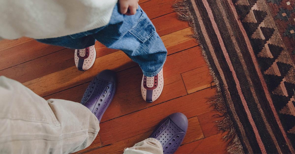 Adult and child's feet in shoes from Native Shoes