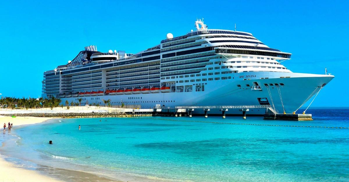 A cruise ship sits docked at a port of call