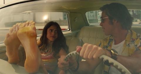 Still of Margaret Qualley and Brad Pitt in Quentin Tarantino's 'Once Upon a Time... in Hollywood'