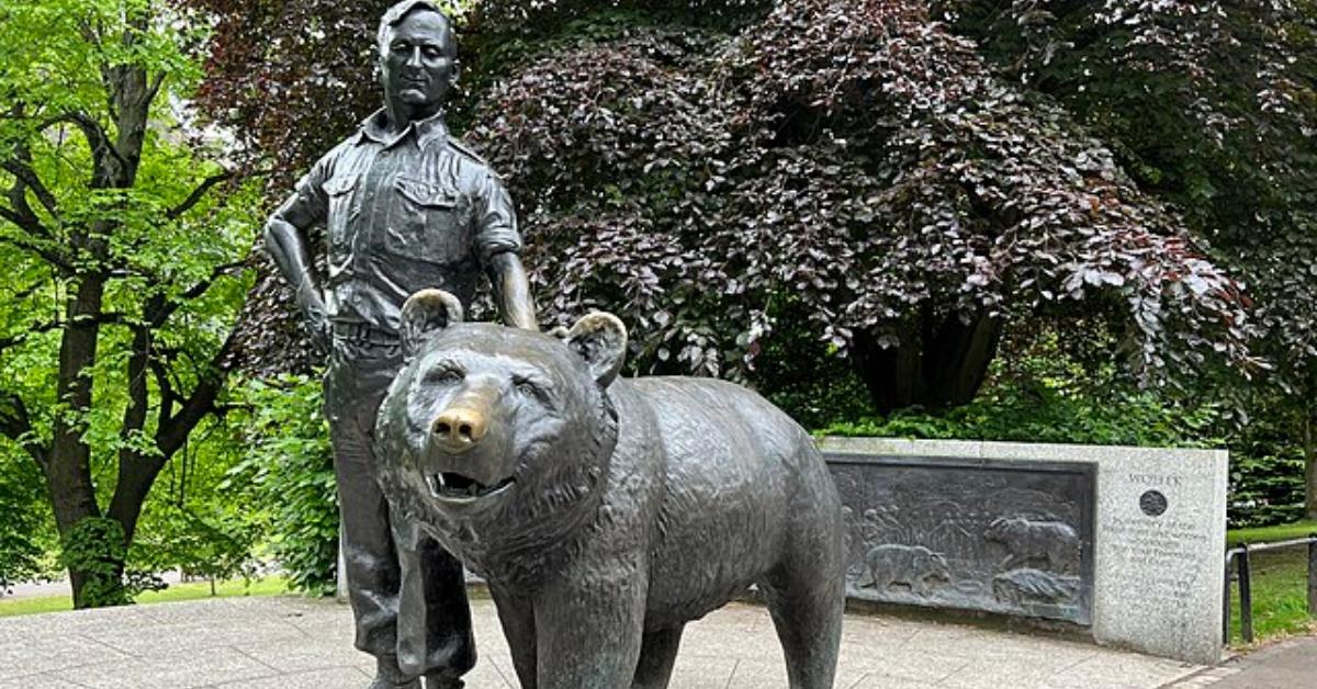 Statue of soldier and bear.