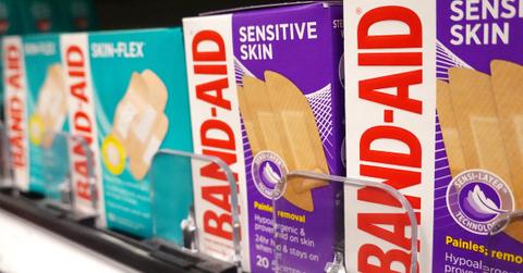 Two Johnson & Johnson Band-Aid products are displayed for sale in a store.