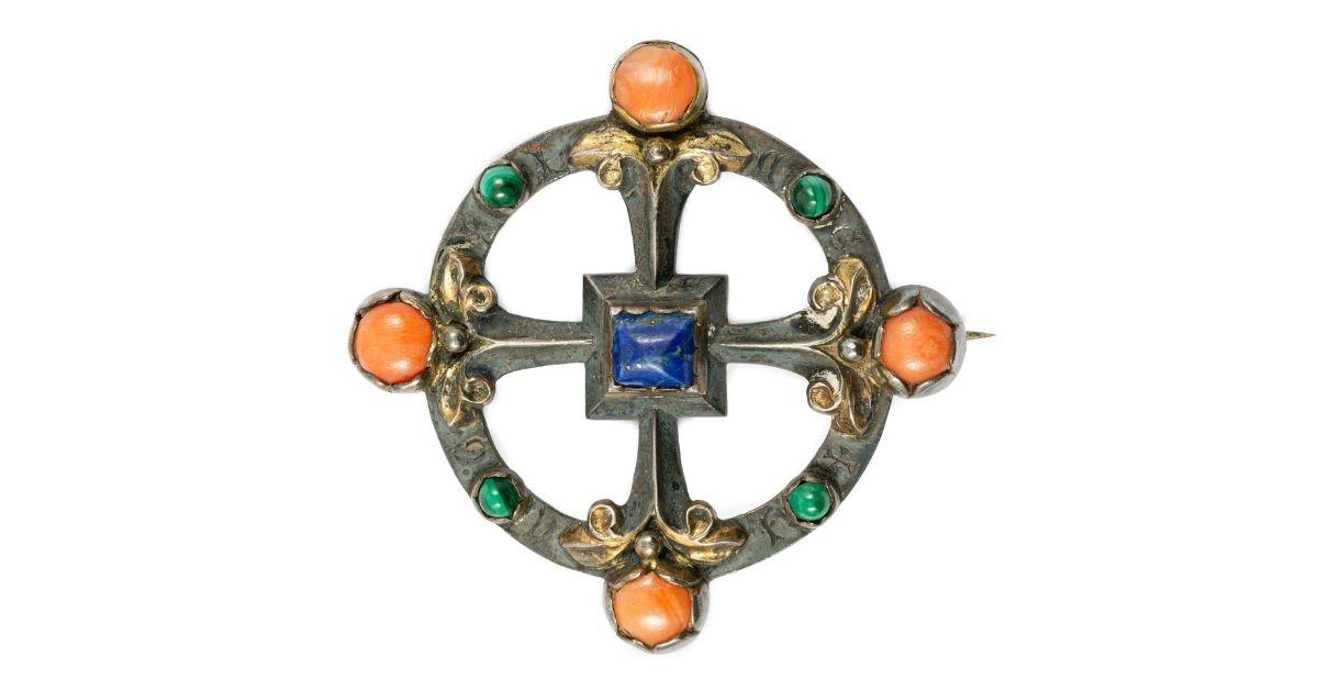 Up close image of antique brooch worth $19,000. 