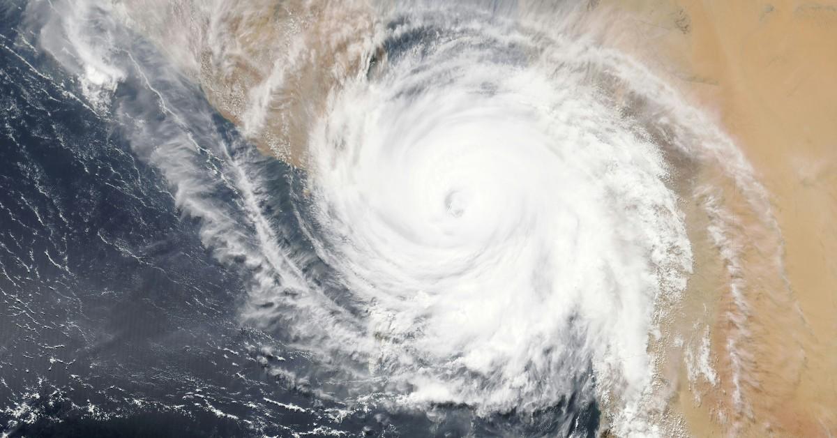 Satellite view of a hurricane system over land and water