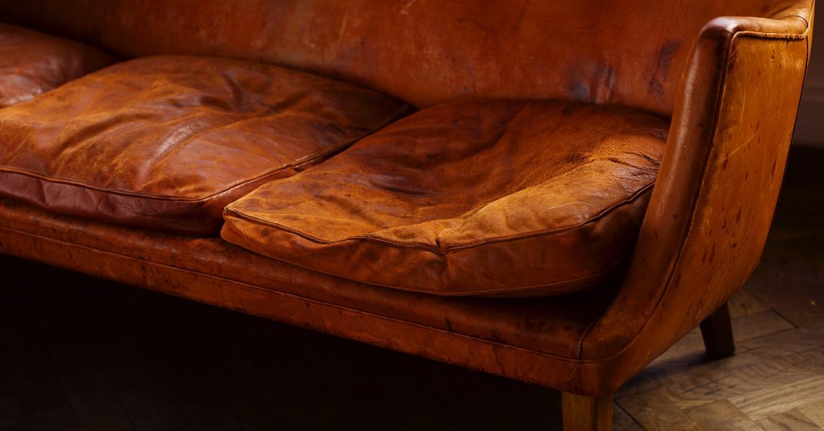 Worn leather couch.