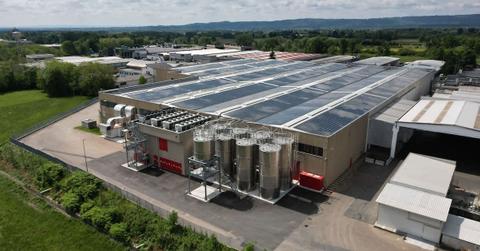 Coca-Cola's state-of-the-art facility in Northern Italy where the company uses recycled plastic to churn out its famous soda bottles (Cover Image Source: Coca-Cola HBC Italia)