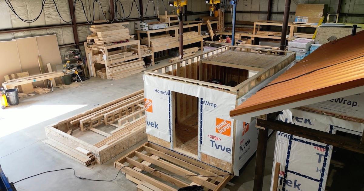 Tiny home being constructed in warehouse