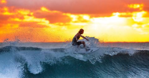 surfer wave sunset the indian ocean