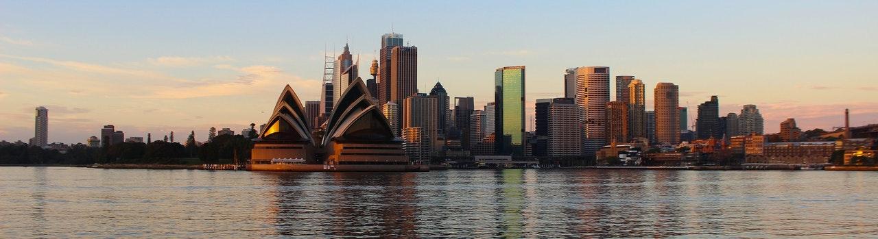 sydney opera house harbor city sunset