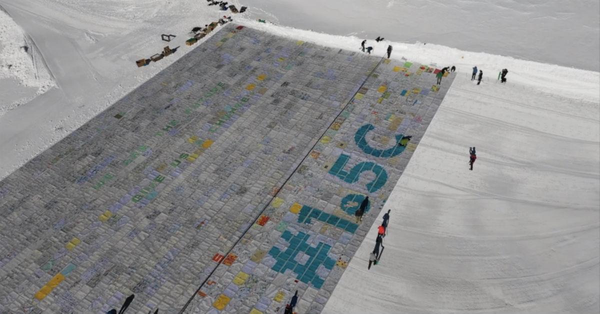 climate activist postcards on glacier