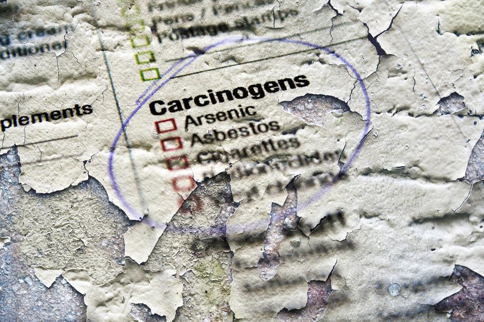 A list of carcinogens circled on a dilapidated piece of paper. 