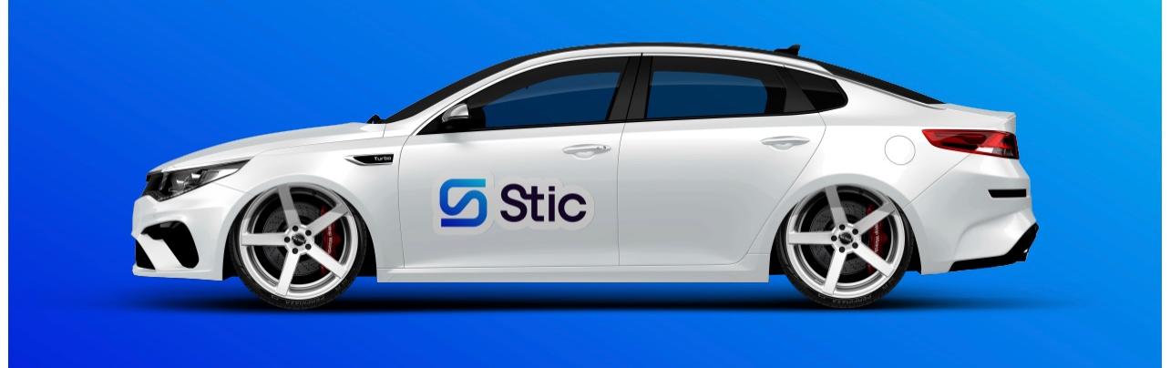 White car with Stic sticker on blue background