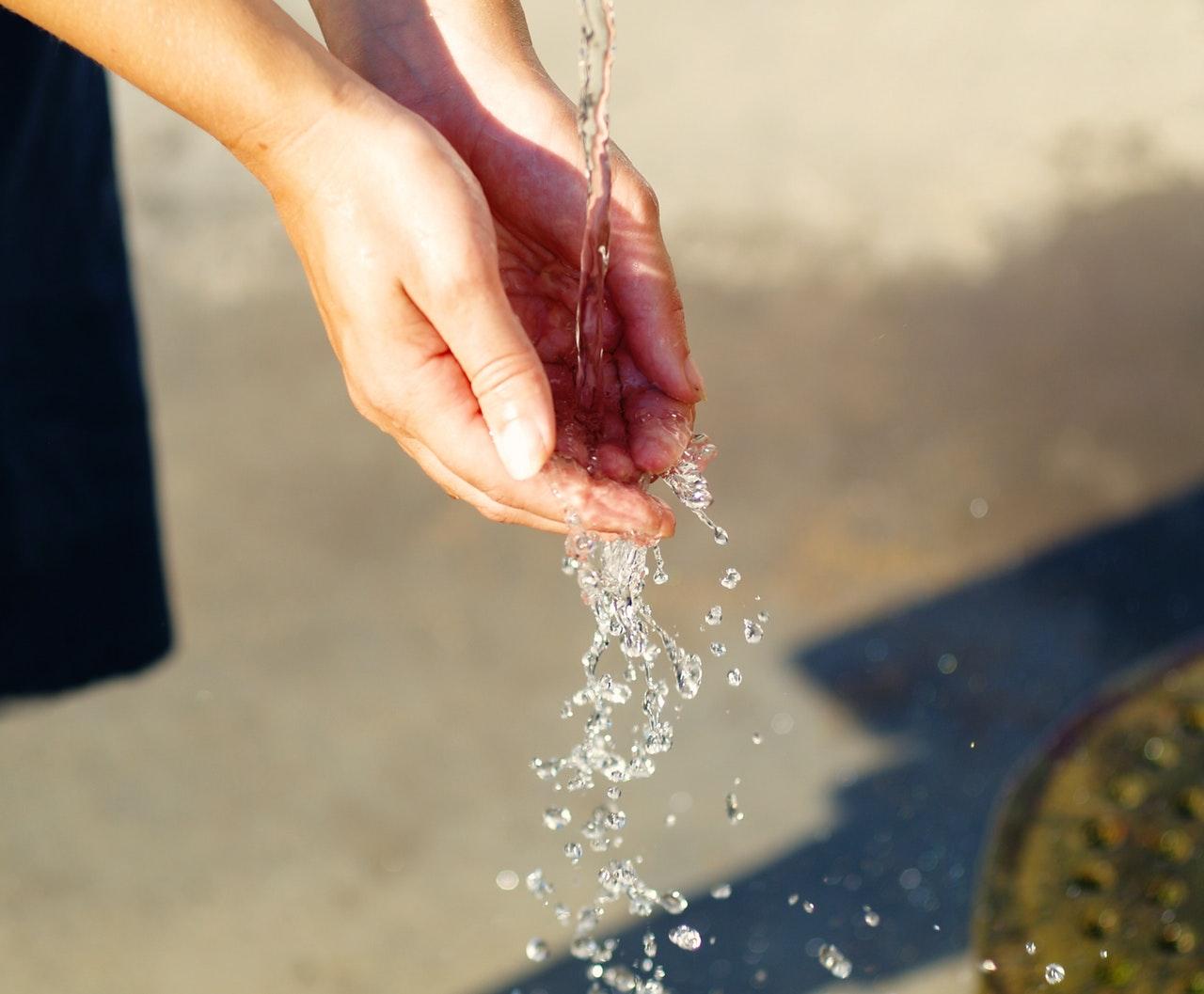 hand water hand in hand female