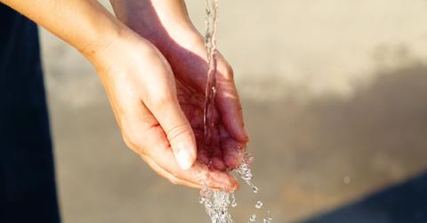 hand water hand in hand female