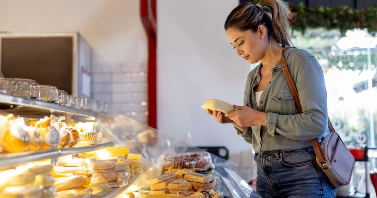 Woman buying cheese from a grocery store (Representative Cover Image Soruce: Getty Images | Hispanolistic)