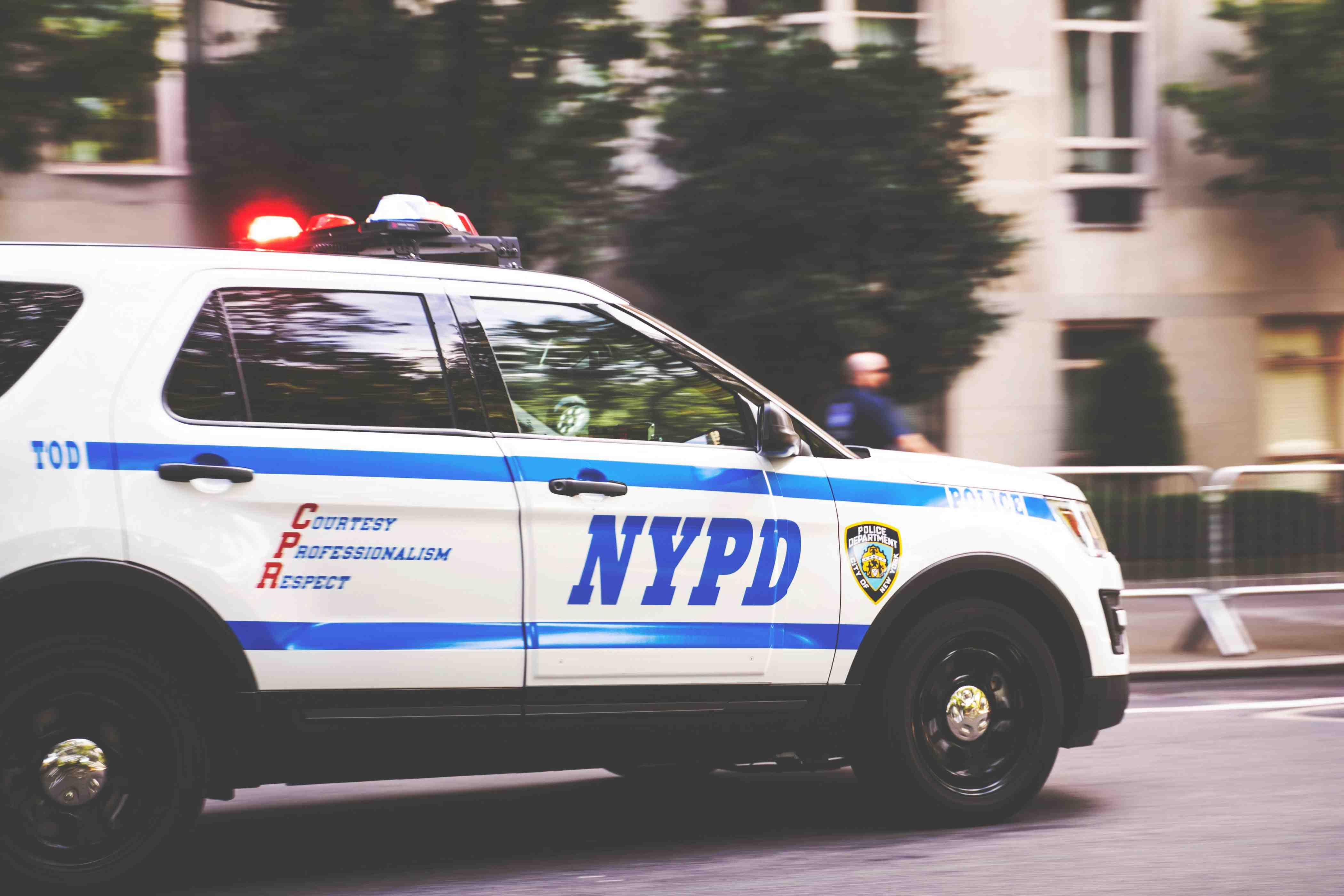An NYPD vehicle is pictured driving through New York.