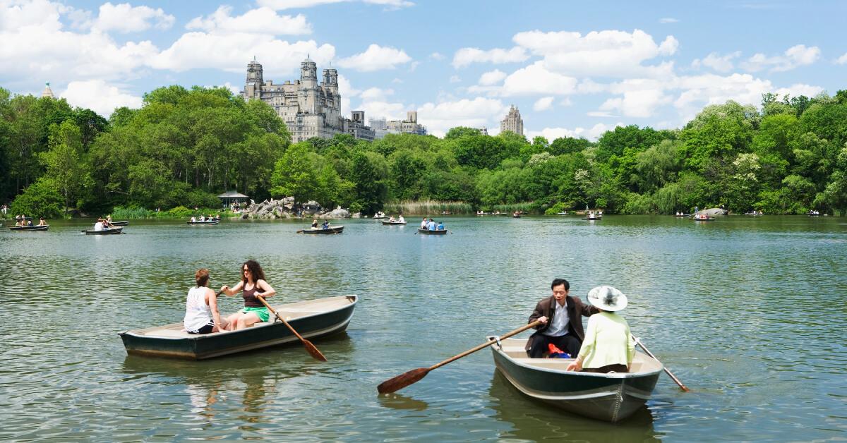 Photo of people canoeing on Turtle Pond in Central Park lake