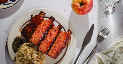Photo of plant-based meat company Juicy Marbles's Baby Ribs on a while plate on a set table