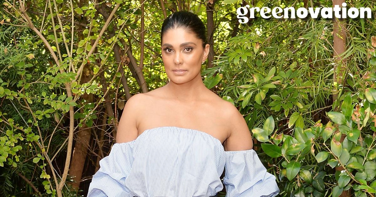Rachel Roy poses in front of trees